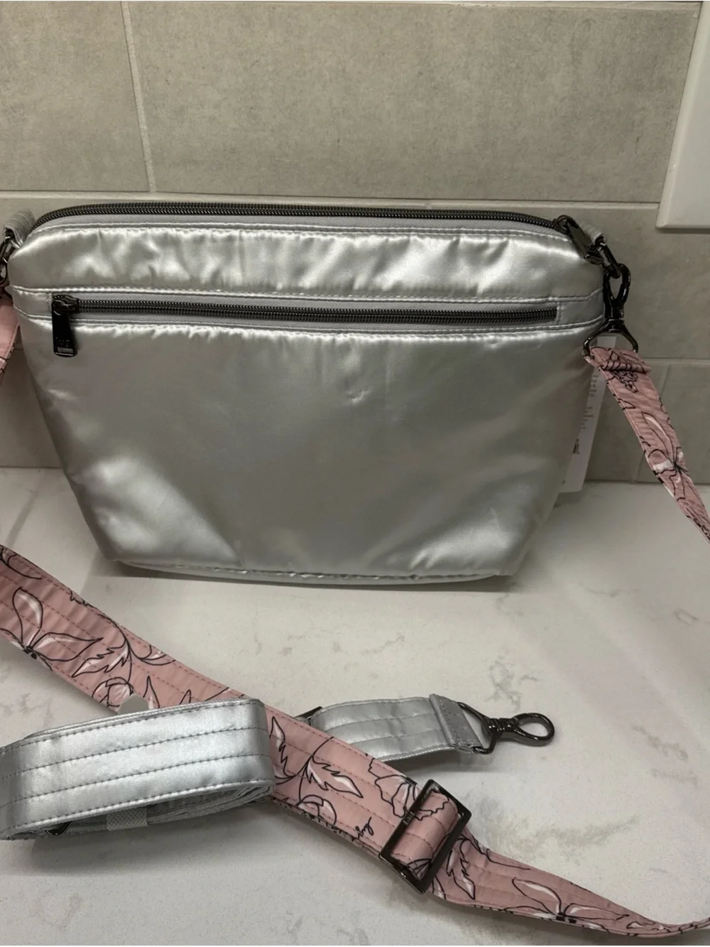 NWT lug Flare Metallic Silver Quilted Crossbody with Pink Floral & silver straps